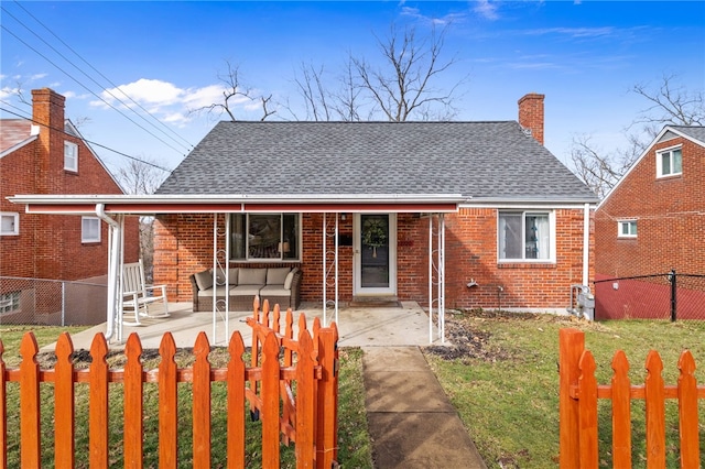 view of front of property with a patio area