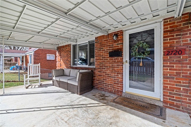 entrance to property with a patio area