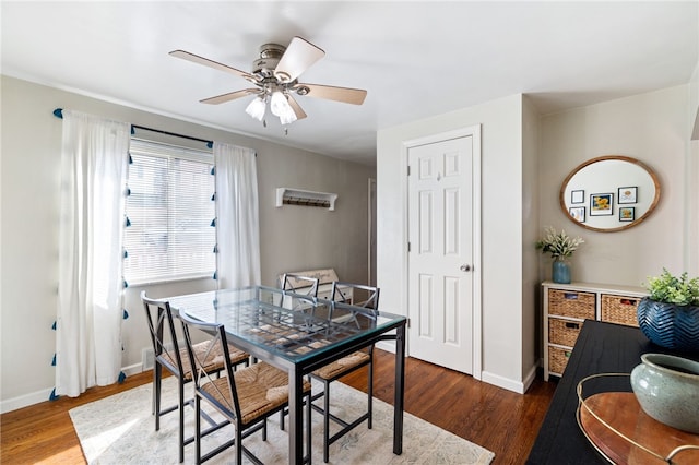 dining room featuring ceiling fan and dark hardwood / wood-style flooring