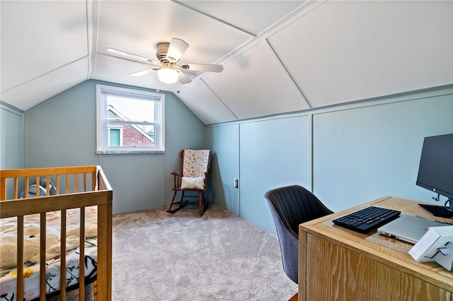 carpeted bedroom featuring lofted ceiling and ceiling fan