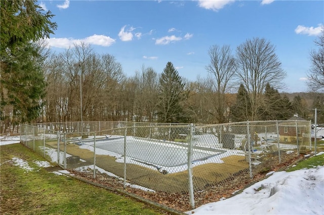 view of snow covered pool