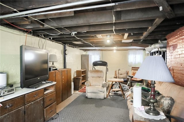 basement with light colored carpet