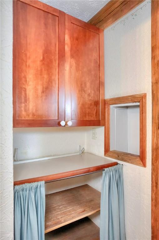 kitchen with a textured ceiling