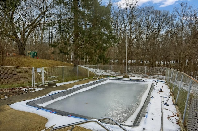 view of snow covered pool