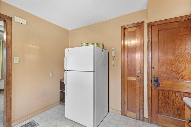 kitchen with white fridge