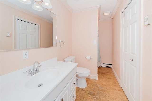 bathroom with baseboard heating, vanity, toilet, and crown molding