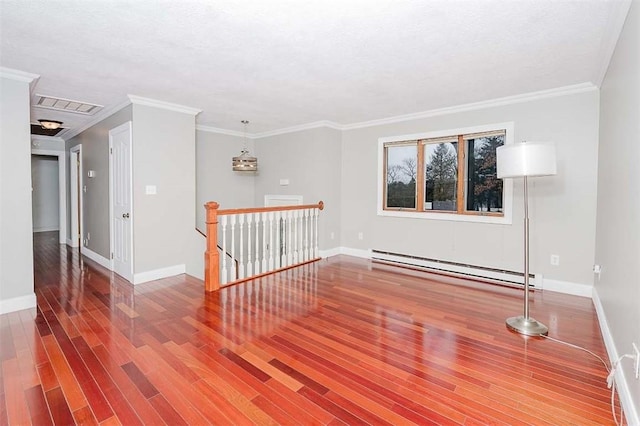 unfurnished room featuring ornamental molding, hardwood / wood-style floors, and baseboard heating