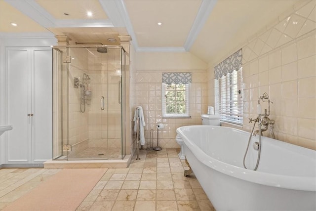 bathroom featuring crown molding, tile walls, and plus walk in shower