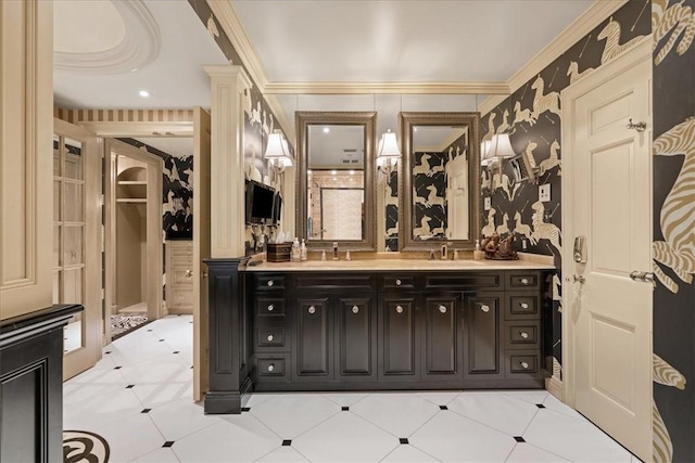 bathroom with vanity and crown molding