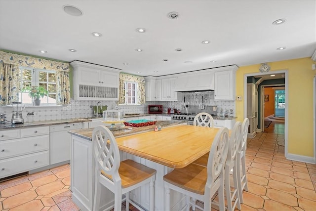 430 Woodland Rd, Edgeworth, PA 15143 - dining space with healthy amount of natural light, recessed lighting, and light tile patterned flooring