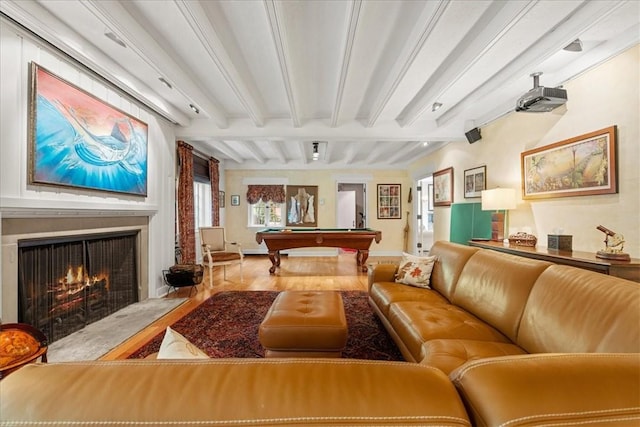 interior space with hardwood / wood-style flooring, beamed ceiling, and billiards