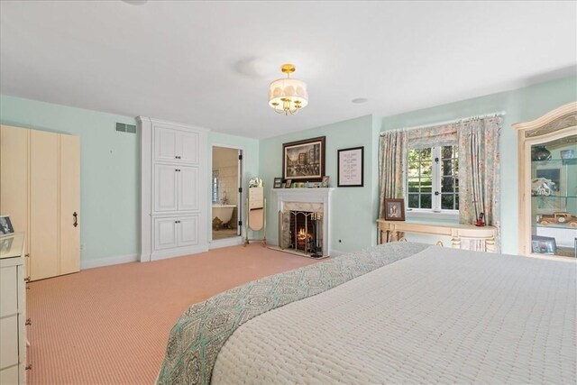 430 Woodland Rd, Edgeworth, PA 15143 - bedroom featuring light colored carpet, a lit fireplace, and baseboards