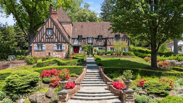 430 Woodland Rd, Edgeworth, PA 15143 - view of front facade featuring stairs and a chimney