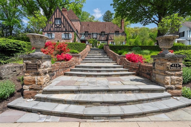 430 Woodland Rd, Edgeworth, PA 15143 - view of front of property with stairway and a chimney