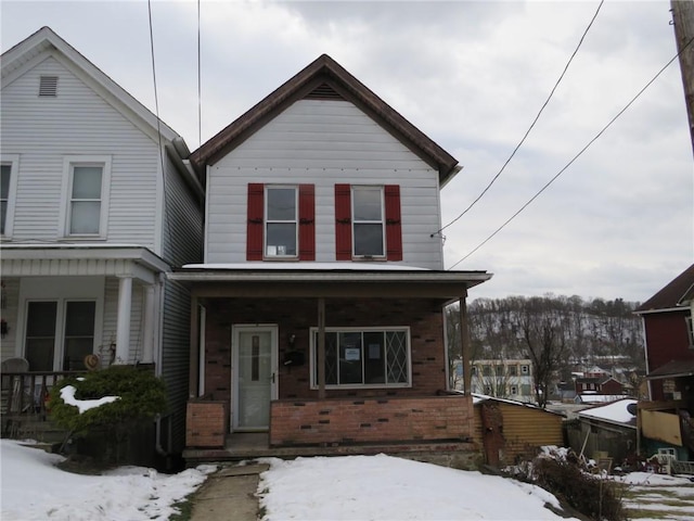 view of property with covered porch