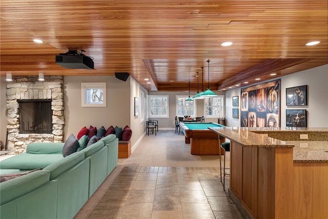 game room with baseboards, wooden ceiling, a raised ceiling, and recessed lighting