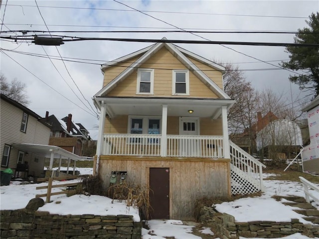 view of front of home featuring covered porch