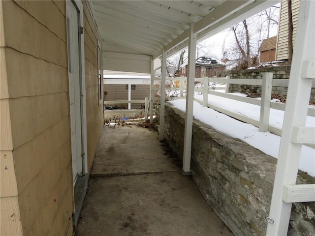 view of snow covered patio