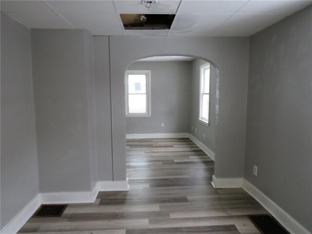 empty room with wood-type flooring