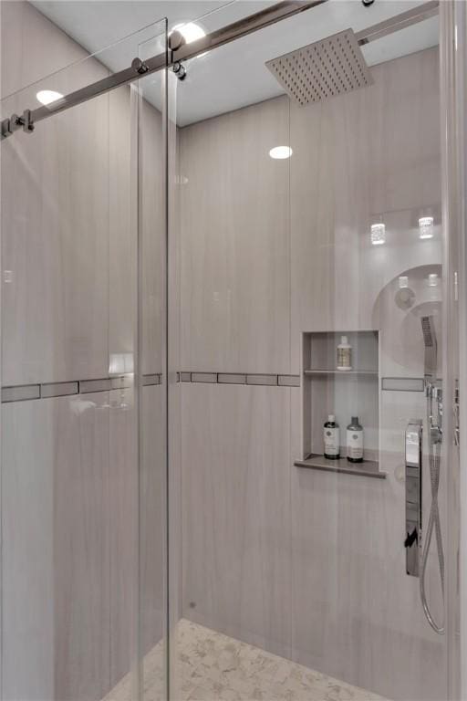 bathroom featuring an enclosed shower