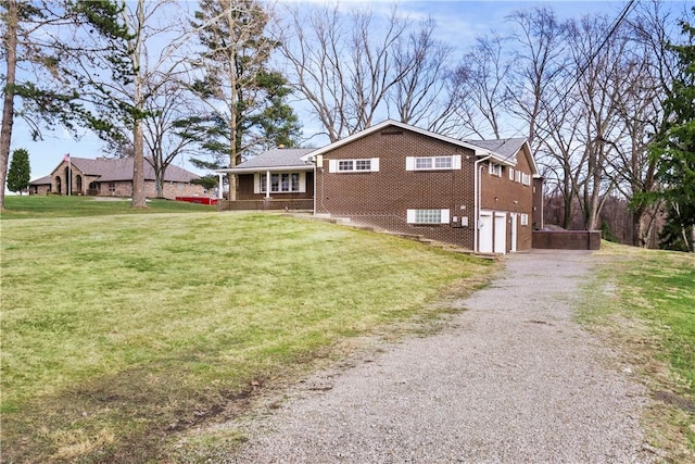 view of property exterior with a garage and a lawn