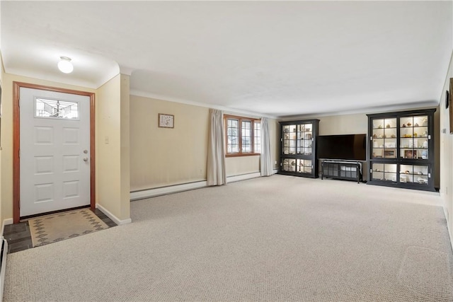 unfurnished living room featuring crown molding, carpet flooring, and a baseboard heating unit