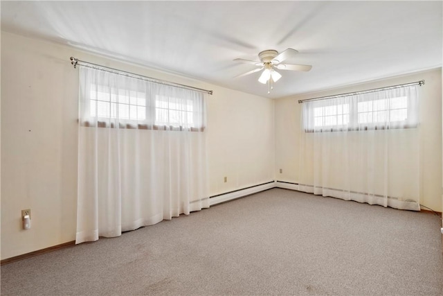 unfurnished room with ceiling fan and light colored carpet