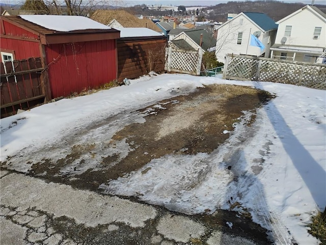 view of yard covered in snow