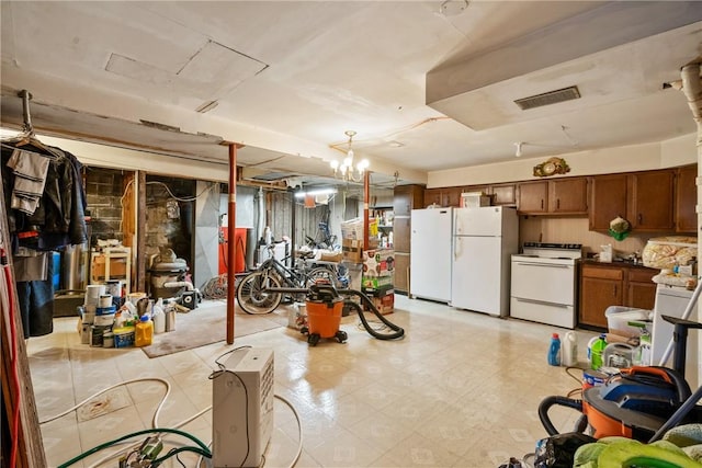 basement with white refrigerator