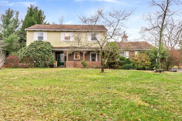 view of front property featuring a front yard