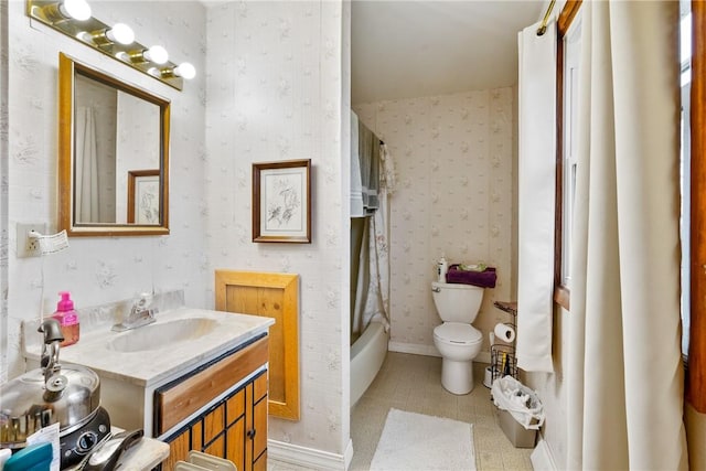 full bathroom with vanity, shower / bathtub combination with curtain, tile patterned floors, and toilet