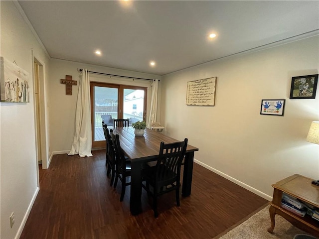 dining area featuring dark hardwood / wood-style floors