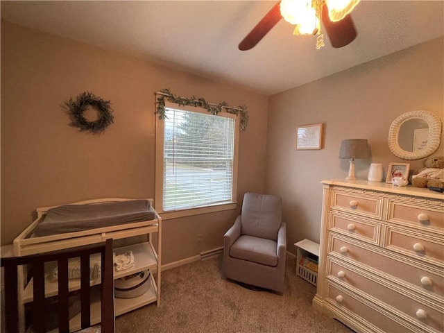 interior space with carpet floors and ceiling fan