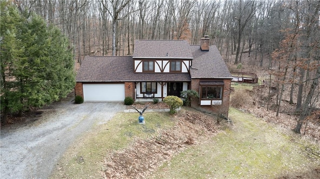 view of front of home featuring a garage and covered porch