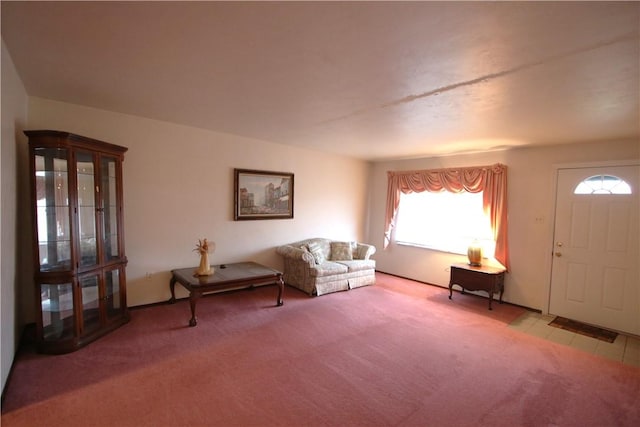 living room featuring light carpet