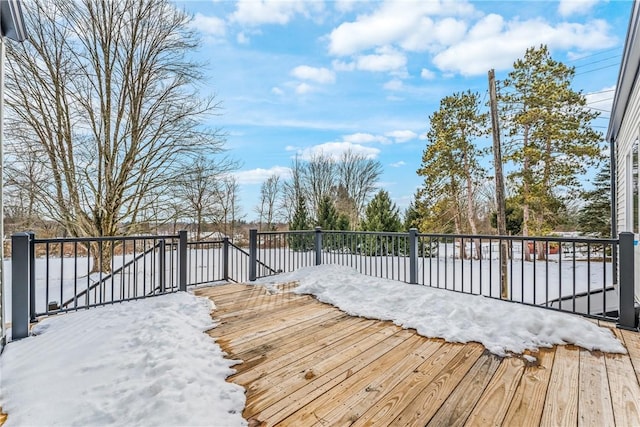 view of snow covered deck