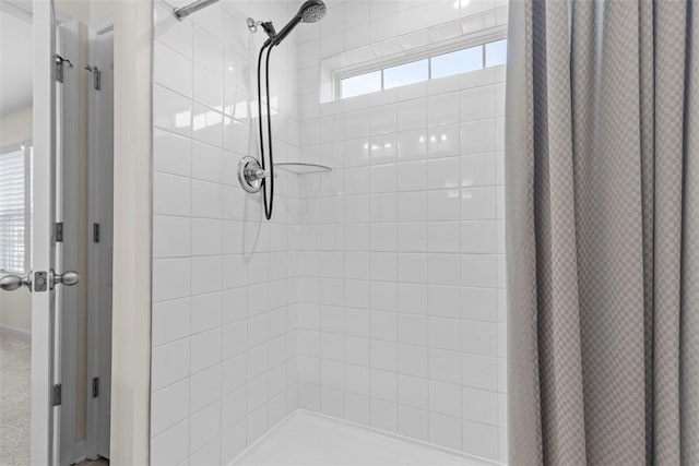 bathroom featuring curtained shower