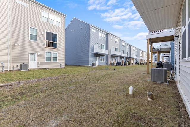 view of yard with central air condition unit