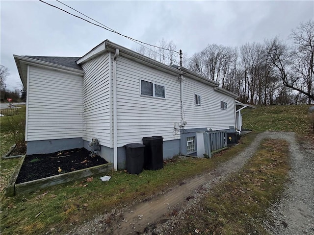 view of home's exterior featuring cooling unit