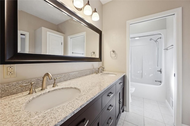 full bathroom featuring  shower combination, toilet, tile patterned flooring, and vanity