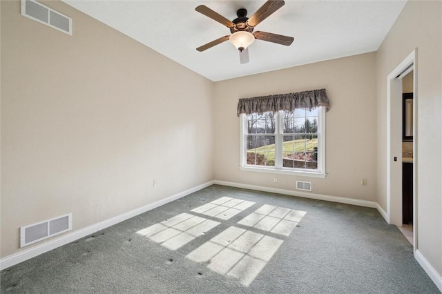 unfurnished room featuring ceiling fan and carpet flooring