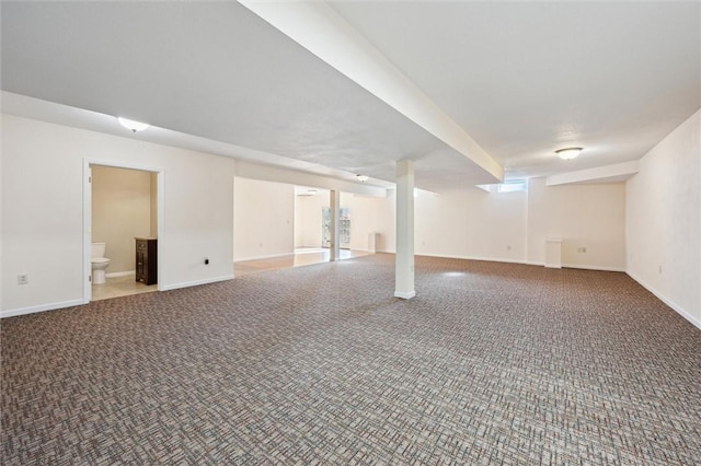 basement with carpet flooring