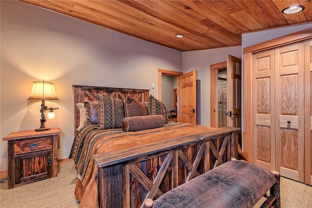 bedroom with light carpet and wood ceiling