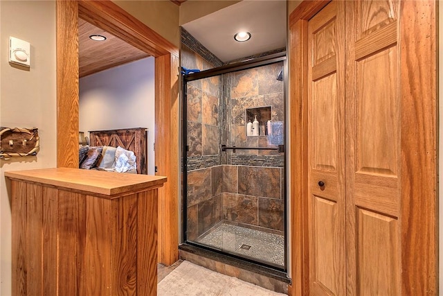 bathroom with an enclosed shower