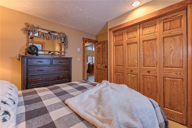 bedroom with a textured ceiling