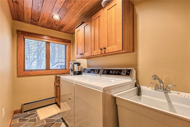 laundry area featuring separate washer and dryer, sink, cabinets, baseboard heating, and wooden ceiling