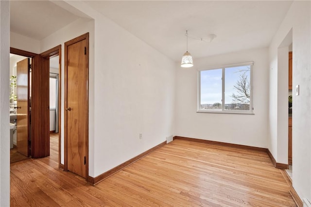 unfurnished dining area with light hardwood / wood-style flooring