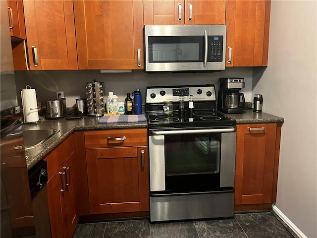 kitchen featuring stainless steel appliances and sink