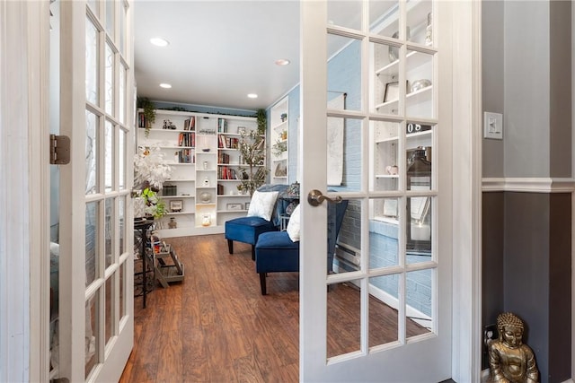 sitting room featuring french doors, wood finished floors, and recessed lighting