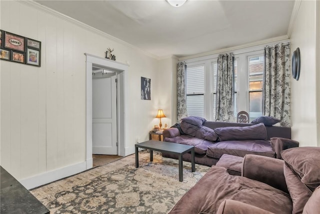 living room with ornamental molding